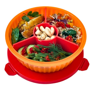 Yumbox's Poke Salad Bowl in tangerine orange with food