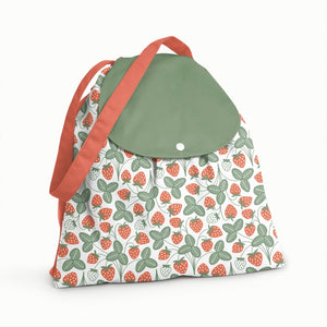 Esembly brand reusable wet bag with 2 compartments and strap, shown in high seas Winter Water Factory print