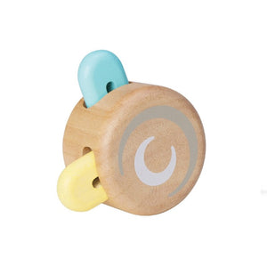 plan peek-a-boo roller toy has colored pieces that pop in and out as the toy rolls