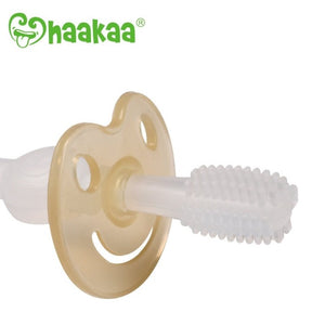 Haakaa 360 toothbrush made for infant and toddlers, shown in aqua blue