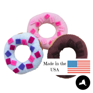 pink, white, and chocolate felt donuts with sprinkles are made in the USA