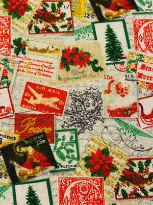 various fabric holiday gift bags in 8 of the 13 prints