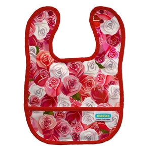 Thirsties brand snapping baby food bib with pocket, shown in Pawsitive Pals cat and dog print