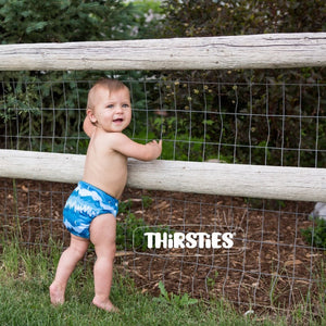 thirsties natural stay dry all in one diaper in  adventure trail print, bears, canoes, pine trees on a white background