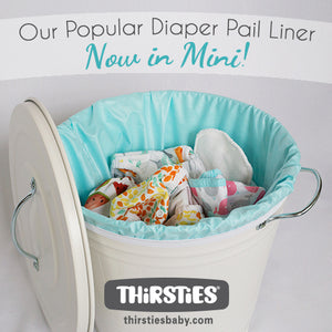 Thirsties Mini Diaper Pail Liner in Aqua in the diaper pail with the Thirsties logo