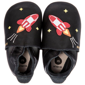 bobux soft sole shoes in black rocket style, red and white rockets on black leather shoes