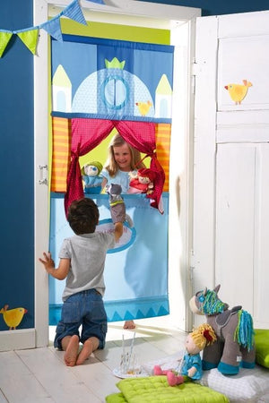 HABA Doorway Puppet Theater measures 67" tall and 31" wide, but the poles extend a bit further (up to 45")
