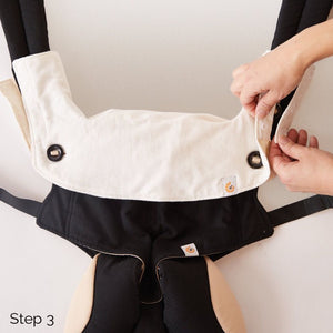 baby in the ergobaby 360 carrier with the ergobaby drool pad and bib in 100% cotton