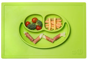 EZPZ Happy Mat shown in lime green, with food, silicone placement and plate all in one