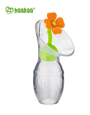 Haakaa Silicone Breast Pump Flower Stopper with orange flower and green stopper base