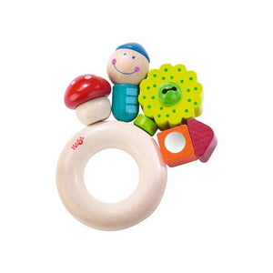 Haba Pixie Clutching Toy, wooden ring with mushroom, house, flower, and person on top