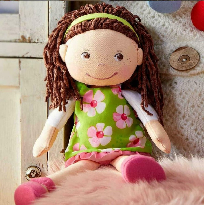 haba soft 12 inch doll, coco in a green dress with pink flowers and pink  shoes