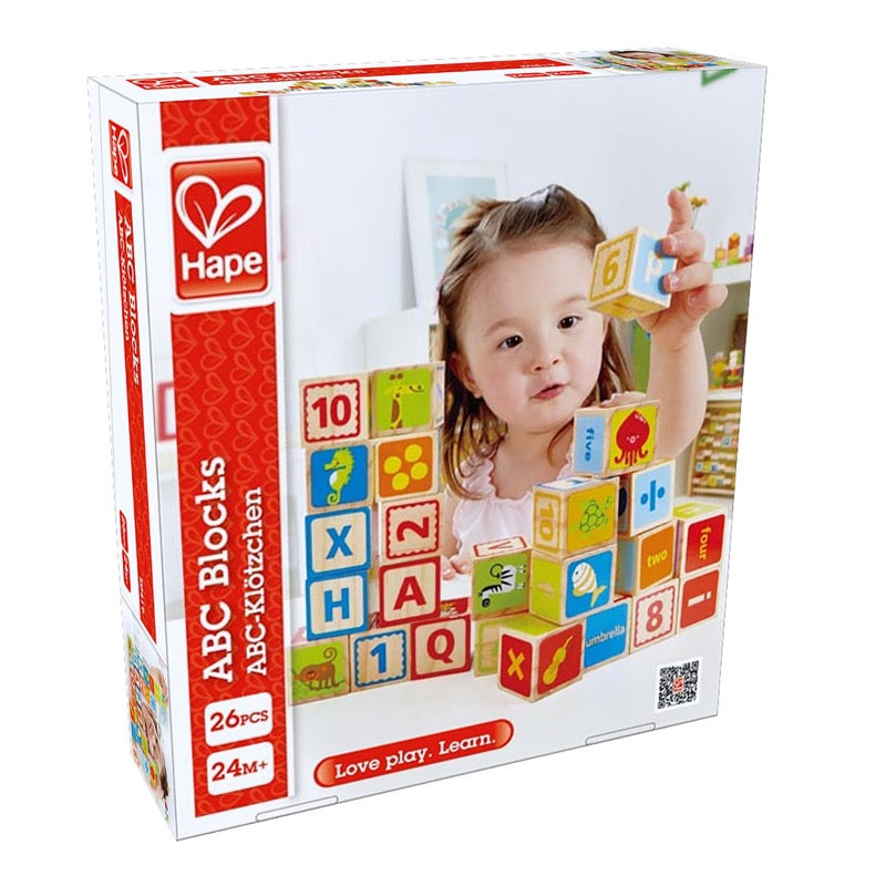 shown are the colorful various sides on the 26 piece hape ABC wooden blocks set