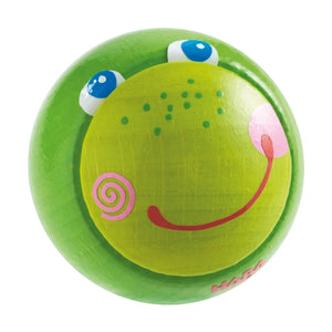 HABA Kullerbü Wooden Fabian Frog Ball is two shades of green with a smiling frog face