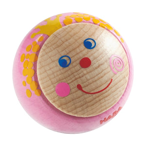 HABA Kullerbü Wooden Fabian Frog Ball is two shades of green with a smiling frog face