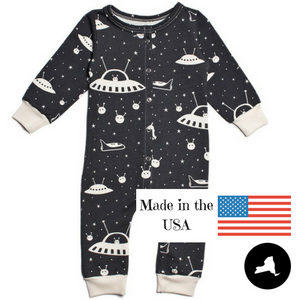 winter water factory french terry jumpsuit in outerspace print with white space ships, stars, and aliens on charcoal black background are made in New York State