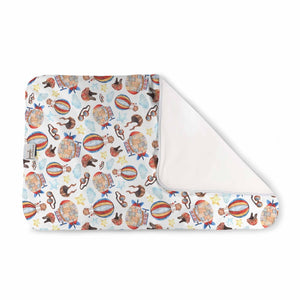 kanga care changing pad in finn , geometric print.