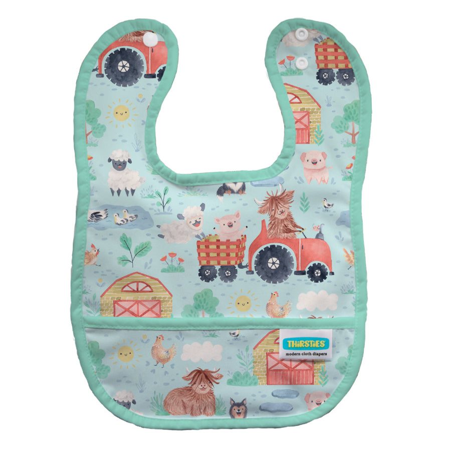 Thirsties brand snapping baby food bib with pocket, shown in Pawsitive Pals cat and dog print