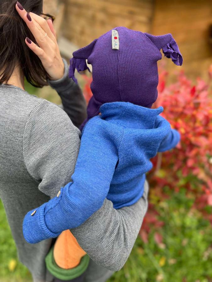 many months owl earflap beanie on a doll in elephant gray