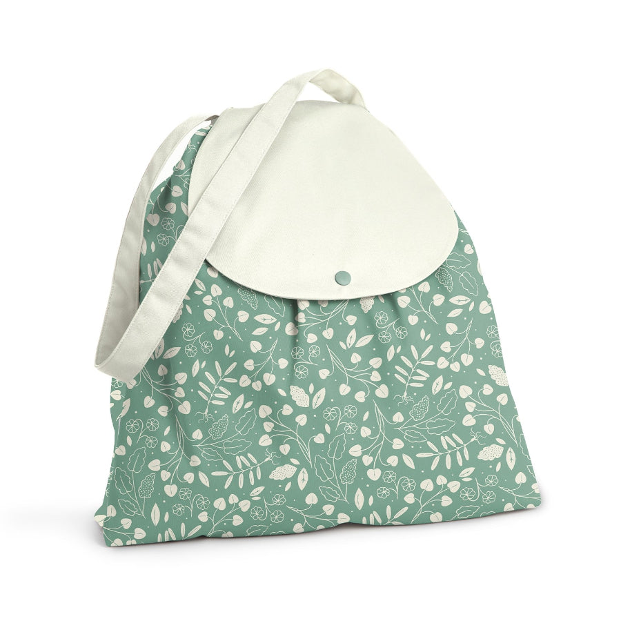 Esembly brand reusable wet bag with 2 compartments and strap, shown in botanic garden print