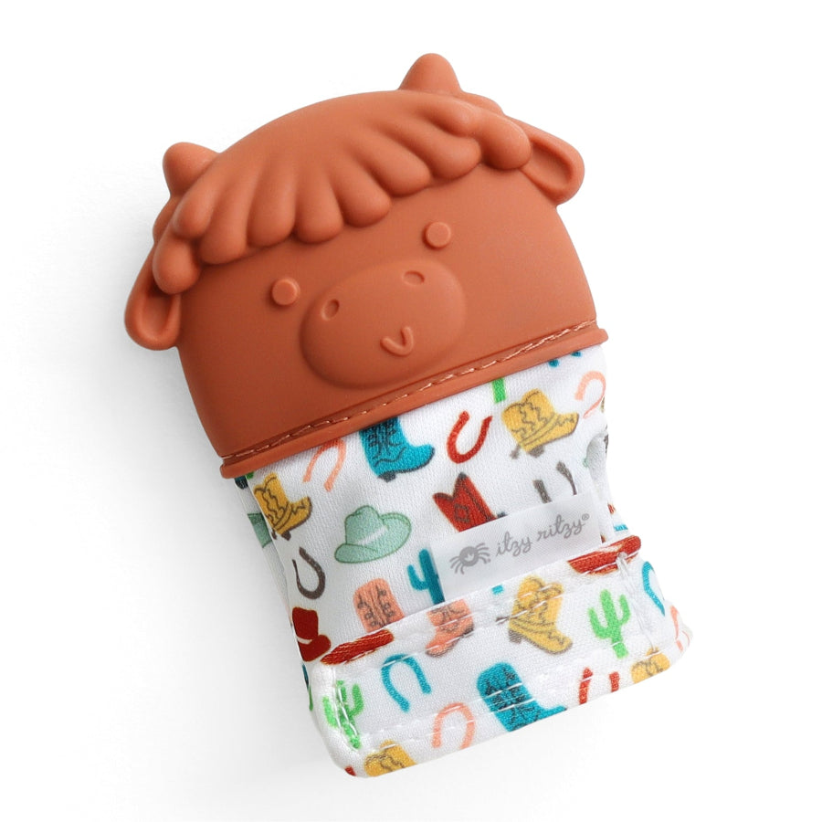itzy ritzy teething mitt with rust orange colored highland cow silicone top and western print polyester mitt