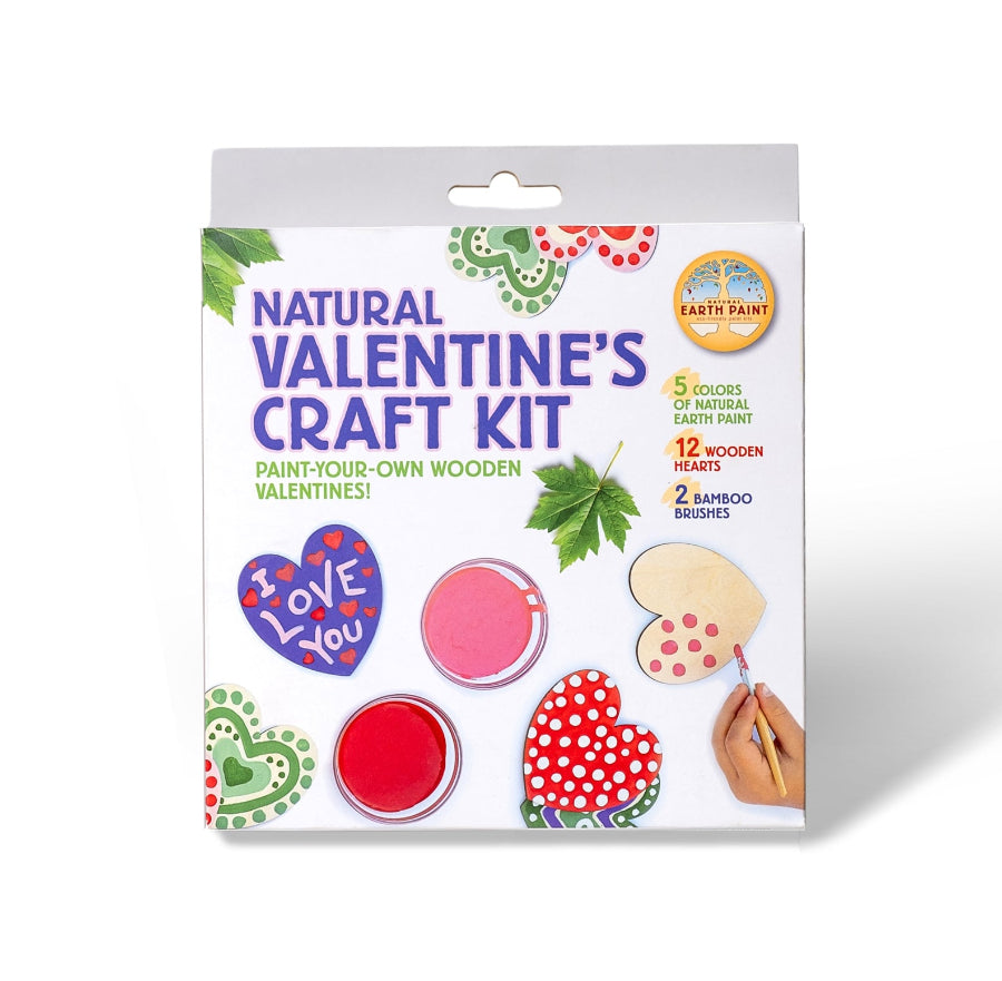 Valentine's craft kit with heart-shaped wooden pieces and paint supplies on a white background, made by natural earth paint