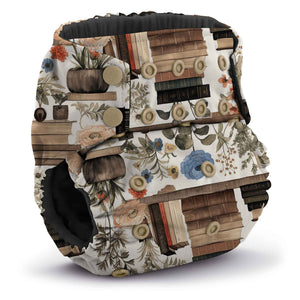 Rumparooz G3 OBV Organic Bamboo Velour Cloth Diaper in adjustable sizing, snap closure at waist, shown in finn print with brand logo and bamboo highlighted