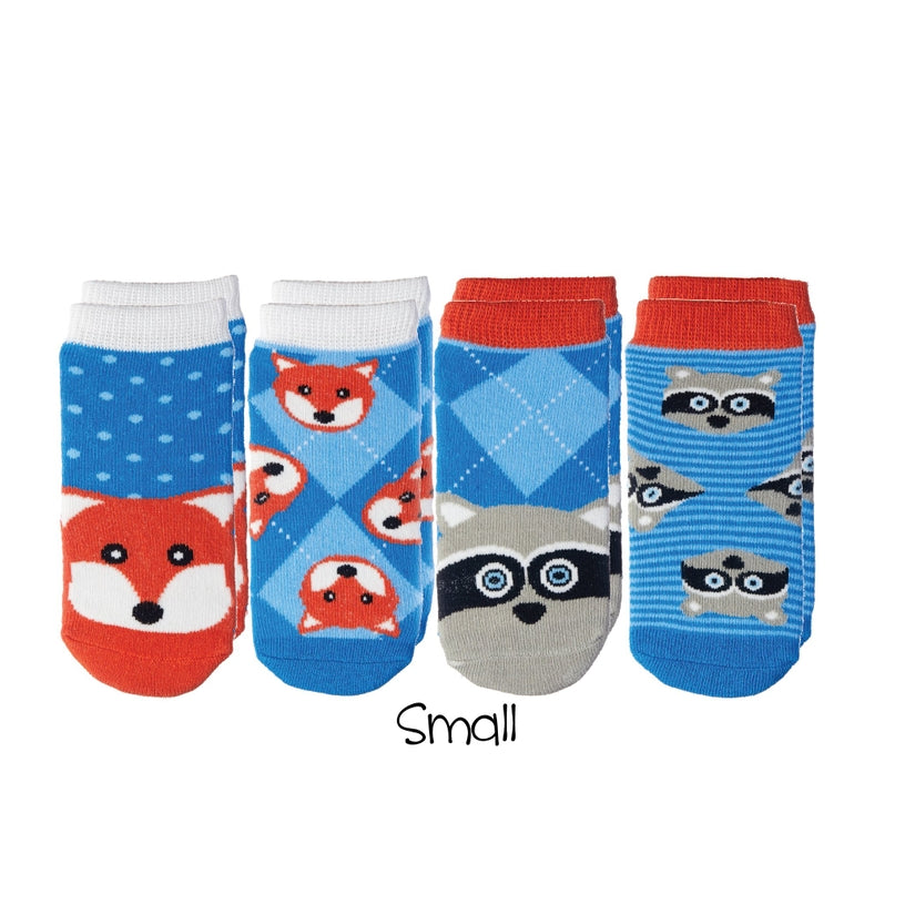 4 pack of mix and matched toddler socks with grippers on bottom, shown in racoon and fox set
