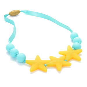 Chewbeads Broadway Juniorbeads Necklace, shown in spearmint color scheme, with glow in the dark stars, silicone teething necklace for big kids