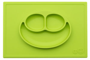 EZPZ Happy Mat shown in lime green, with food, silicone placement and plate all in one