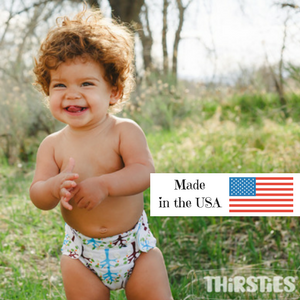 Thirsties Natural All in one diaper on baby, made in the usa, blackbird print