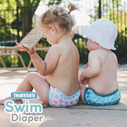 Thirsties Swim Diaper on baby, poolside, with mom, made in the usa