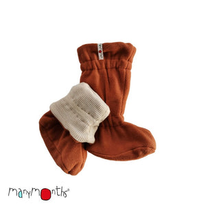Natural wool adjustable baby booties by ManyMonths brand, shown in toasted coconut wool with clay colored fleece shell