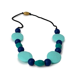chewbeads tribeca necklace in turquoise features three different sizes and colored bead, 100%silicone teething jewelry