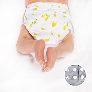 La Petite Ourse Pocket Cloth Diaper, shown on baby in llama print