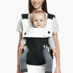 baby in the ergobaby 360 carrier with the ergobaby drool pad and bib in 100% cotton