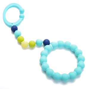 Chewbeads silicone gramercy stroller toy, ring with rainbow beads, shown in rainbow style