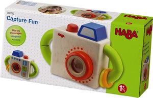 HABA Capture Fun Camera is colorful with bright green handles and a red button that squeaks when pressed down