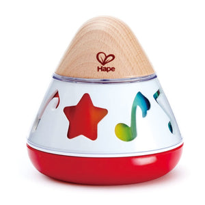 Baby playing with Hape Rotating Music box