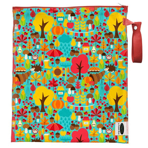 imagine lite wet bag in happy floral print, brilliant primary colored flowers and ferns