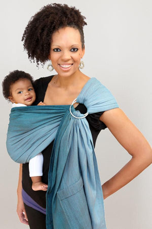 Maya Wrap Lightly Padded Ring Sling in Teal Ombre, shades of teal graduating from light to dark for 8-35 pound children