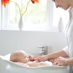 Puj Flyte Infant Tub fits in a sink for easy infant bathing